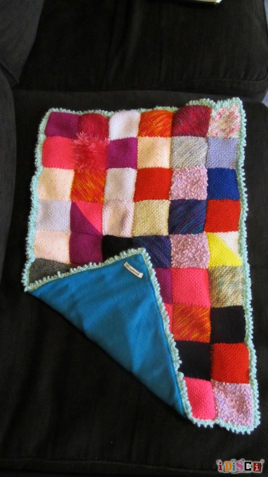Lovely patchwork pram blanket.
