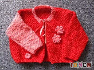 An unusal very pretty girls hand knitted cardigan.